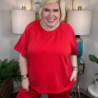 Women's jogger lounge set with raw stitching in red or black