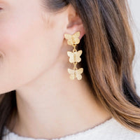 Susan Shaw Hannah triple gold butterfly drop earrings