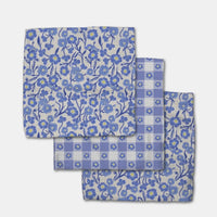 Set of three dish rags with blue floral and checkered patterns