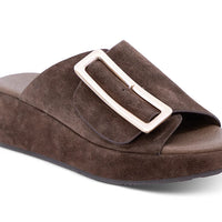 Elara dark brown suede slide sandal with crossover strap and rectangular buckle