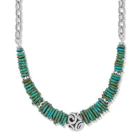 Necklace with turquoise beads and a silver focal bead