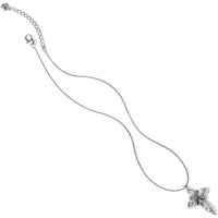 Silver necklace with a butterfly pendant on a white background