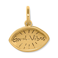 Gold pendant with 'Good Vibes' engraving on a white background