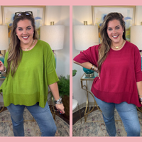 Women's oversized sweater with split side hem available in green or crimson