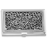 Silver business card holder with intricate pattern on a white background
