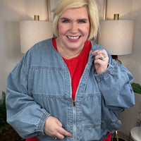Women's denim jacket with metal zipper and elastic hem