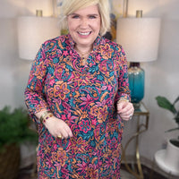 Dear Scarlett stretchy colorful floral dress with pink orange blue and teal tones