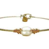 Gold dainty bracelet with single pearl focal bead