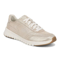 Metallic Beige sneaker with white laces on a white background
