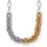 Two-toned silver and gold chain necklace on a white background