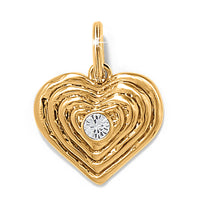 Gold heart-shaped pendant with a central gemstone on a white background