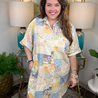 Woman wearing denim patchwork button down dress