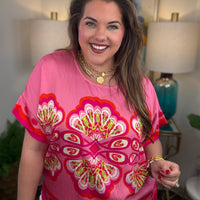 Woman wearing a pink floral top