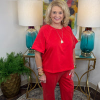 Women's jogger lounge set with raw stitching in red or black