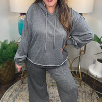 Gray lightweight lounge pants with cream and gold stitching details