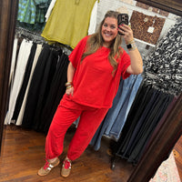 Women's jogger lounge set with raw stitching in red or black