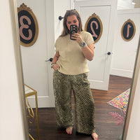 Cream wide-leg pants with brown zebra animal print