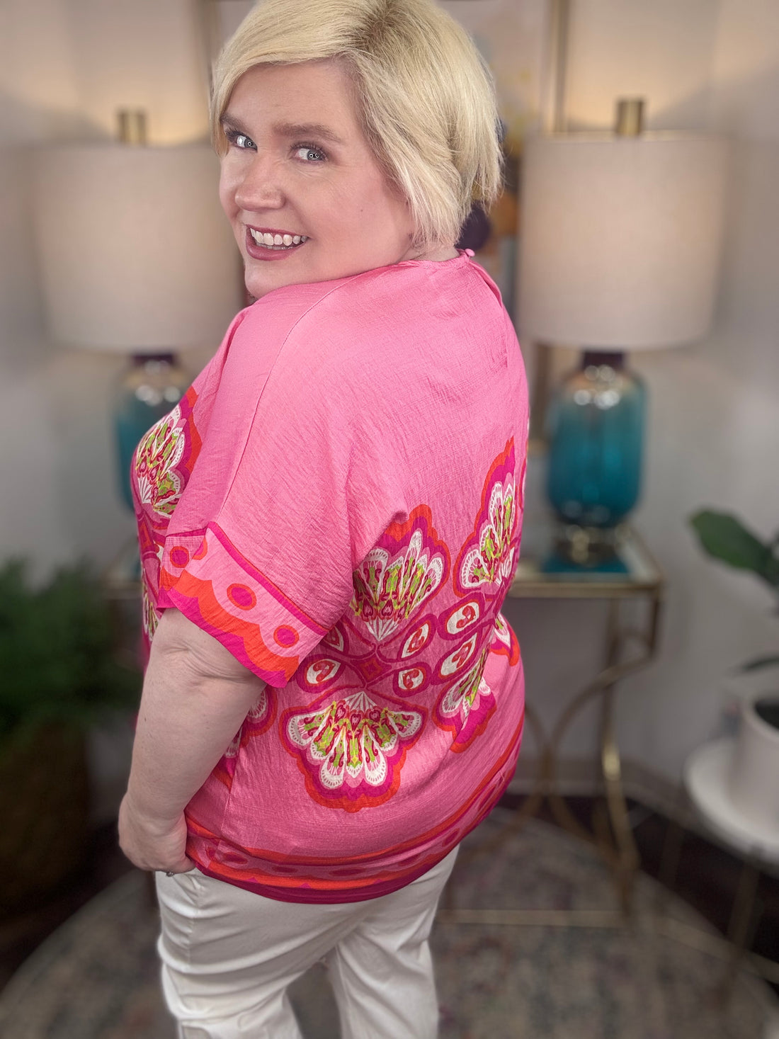 Woman wearing a pink floral top