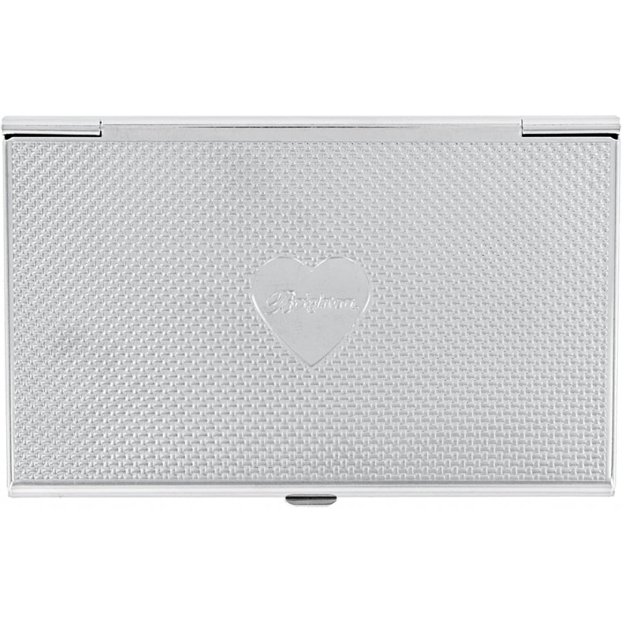 Silver business card holder with intricate pattern 