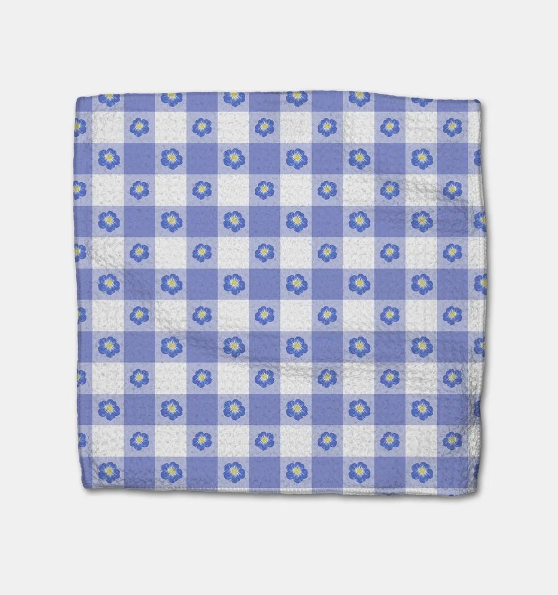 Blue and white checkered dish cloh with flower pattern