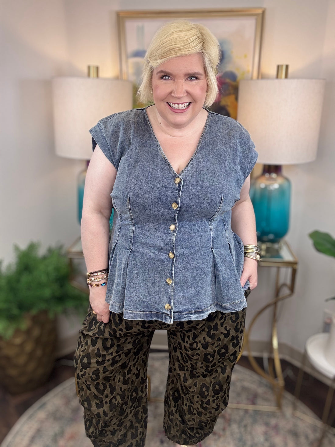 Dark olive green denim jogger pants with black leopard print