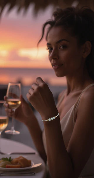 Woman wearing a Sterling Silver Filled bracelet with Sterling Silver Setting, 3 circular CZ stones, 14K Gold Filled wire wrap