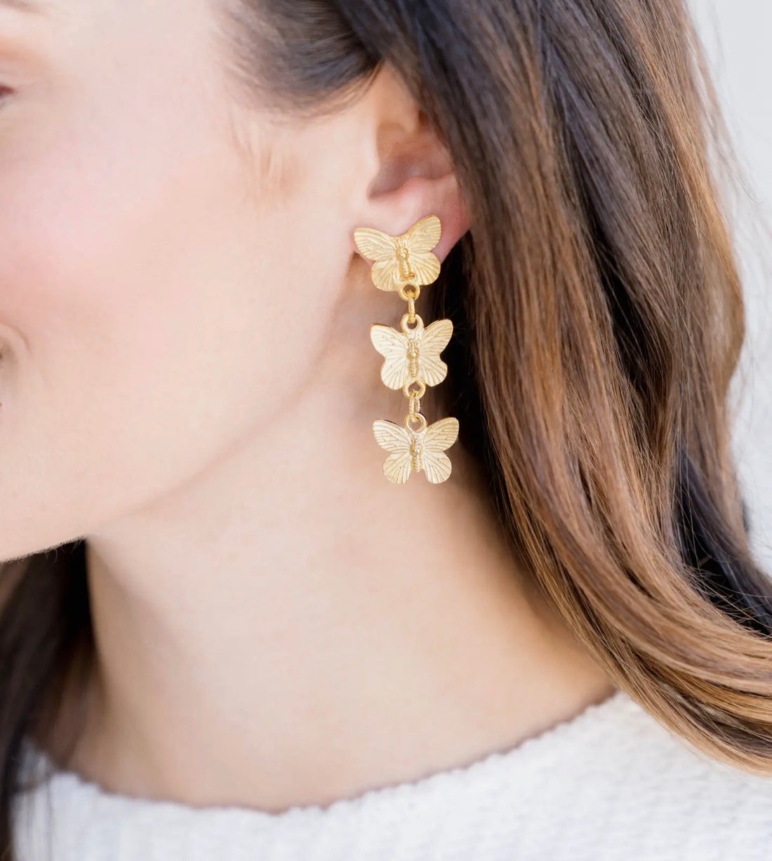 Susan Shaw Hannah triple gold butterfly drop earrings