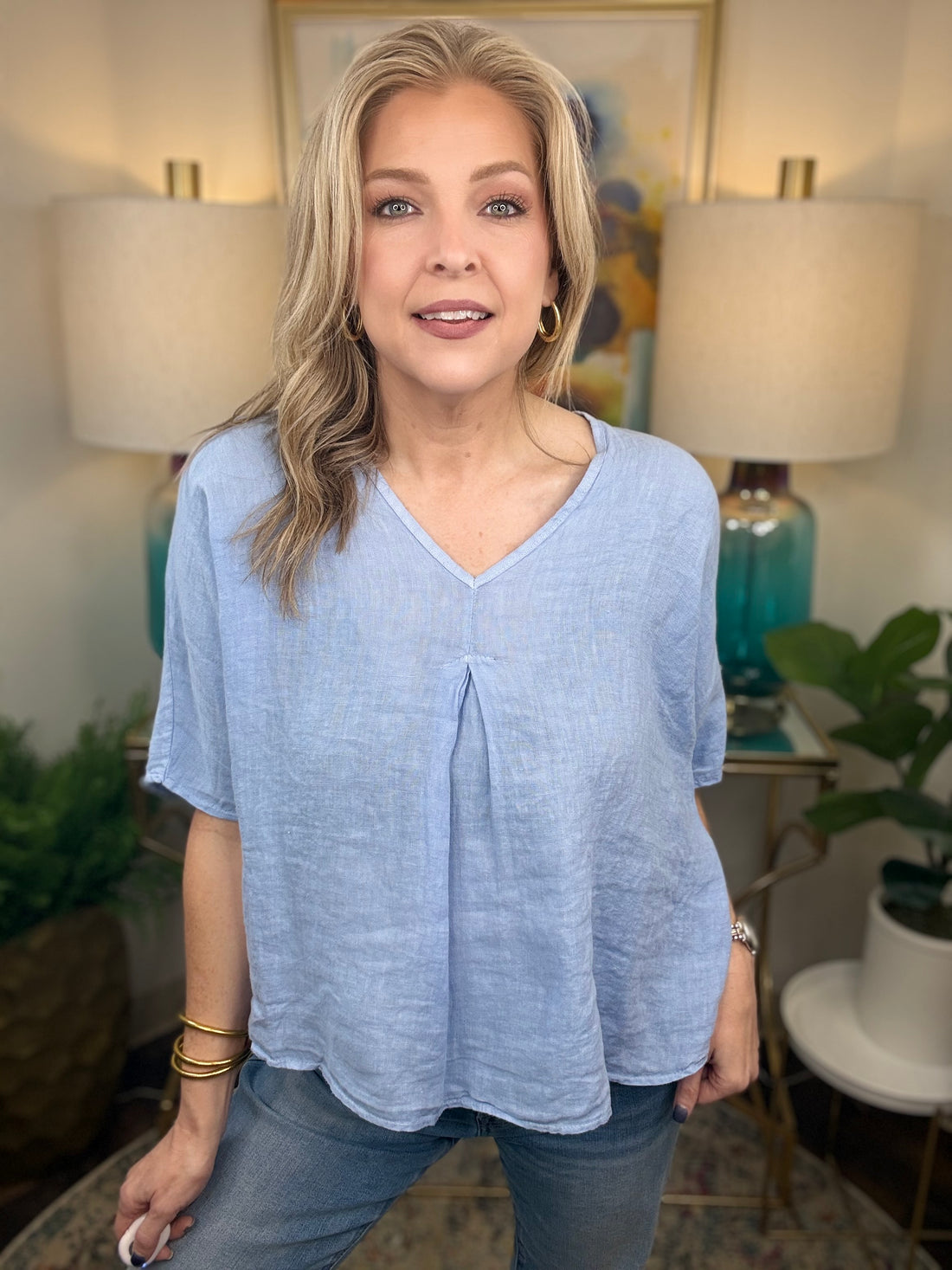 Woman wearing blue linen top