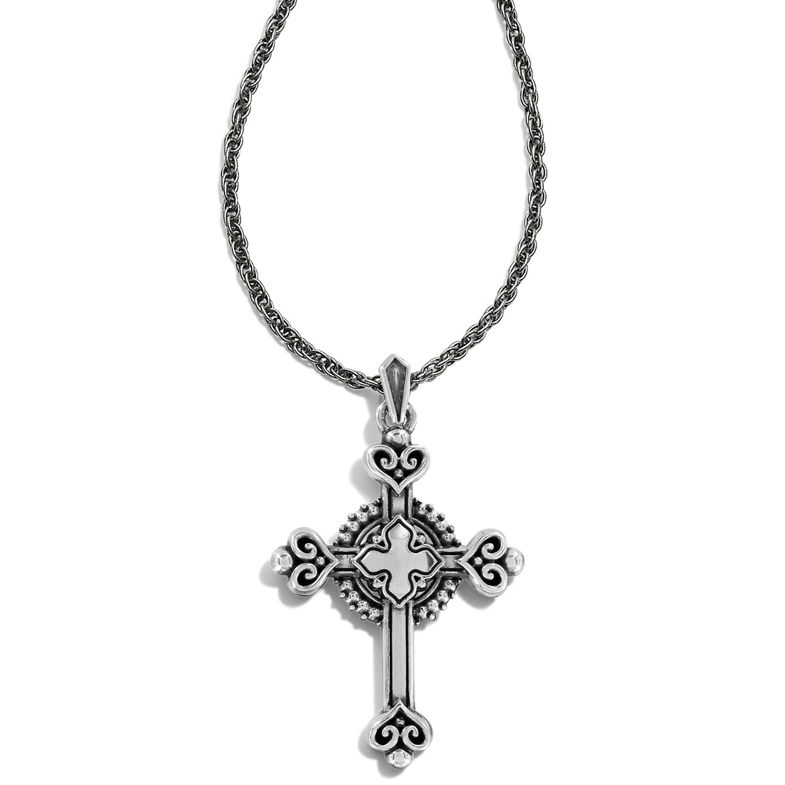 Silver cross pendant necklace on a white background