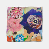 Colorful floral and abstract design on a fabric square