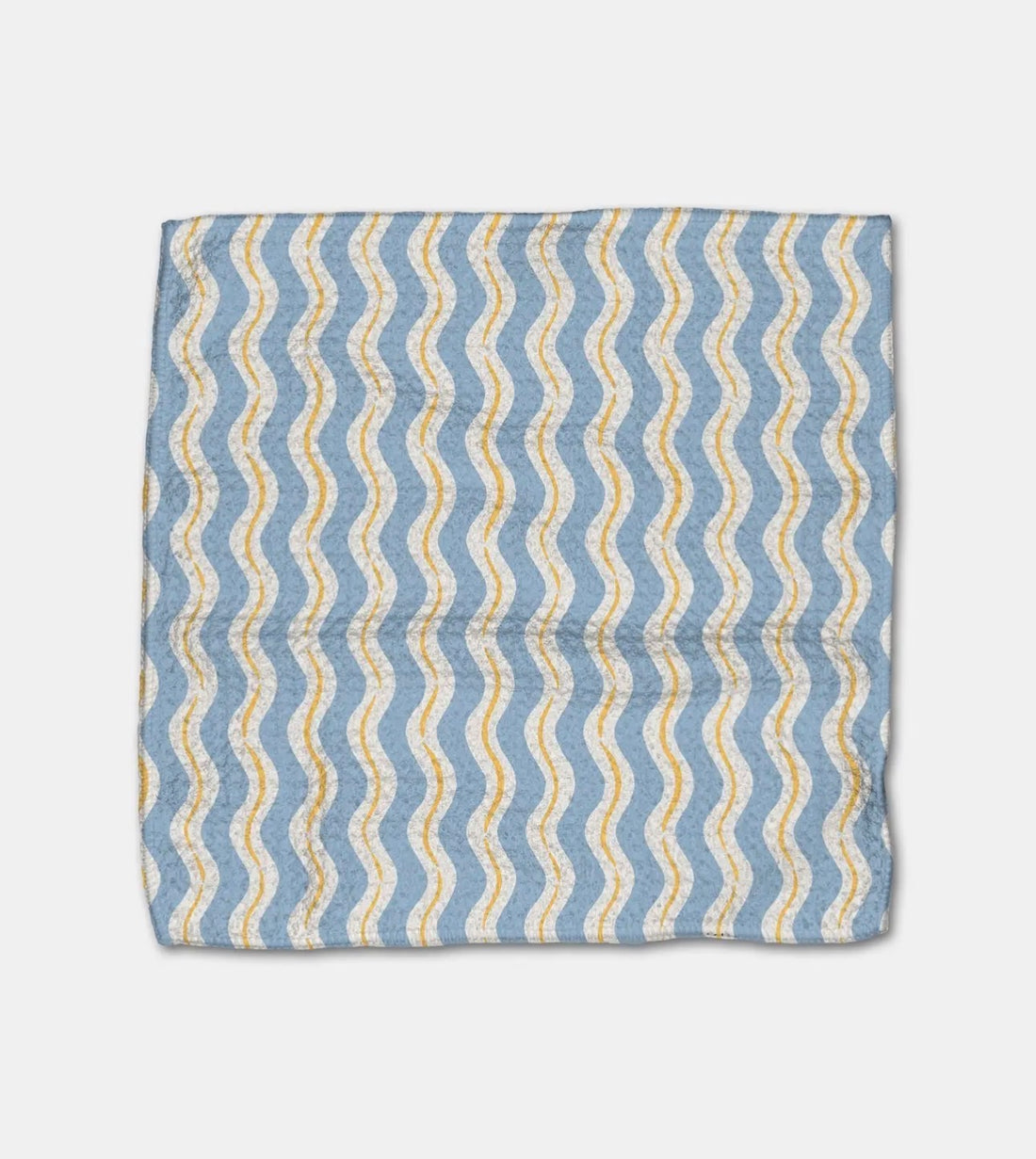 Dishcloth with blue and yellow wavy pattern on a white background