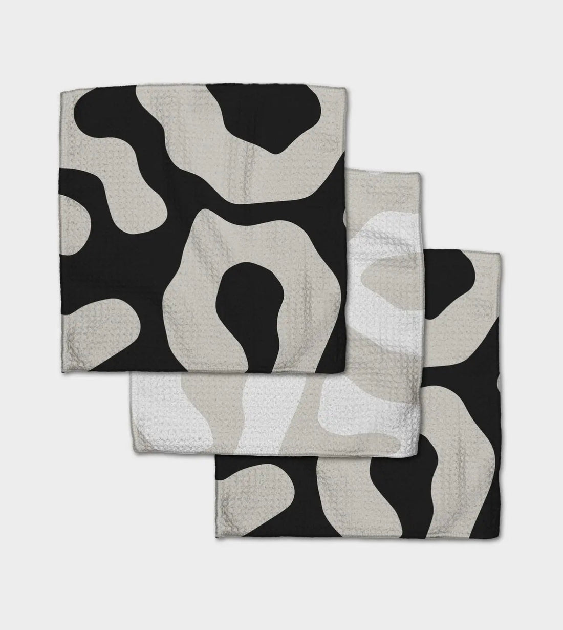 Set of three dishcloths with black and gray abstract patterns