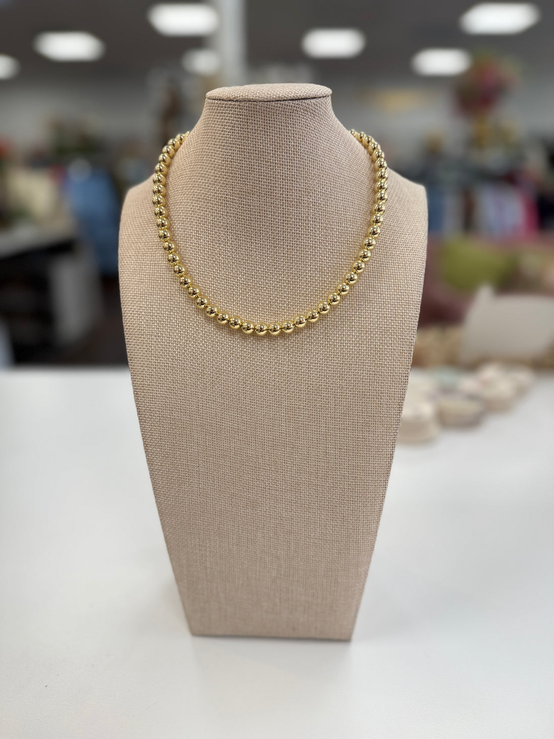 Gold beaded necklace