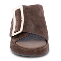 Elara dark brown suede slide sandal with crossover strap and rectangular buckle