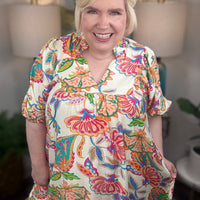 Woman wearing a colorful floral dress