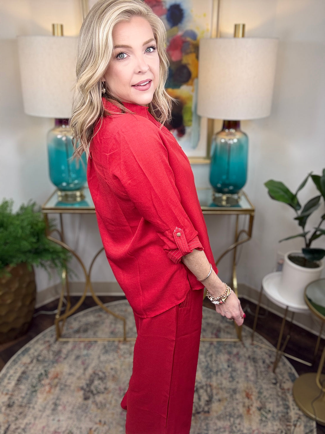 Women’s red matching set with gold button details
