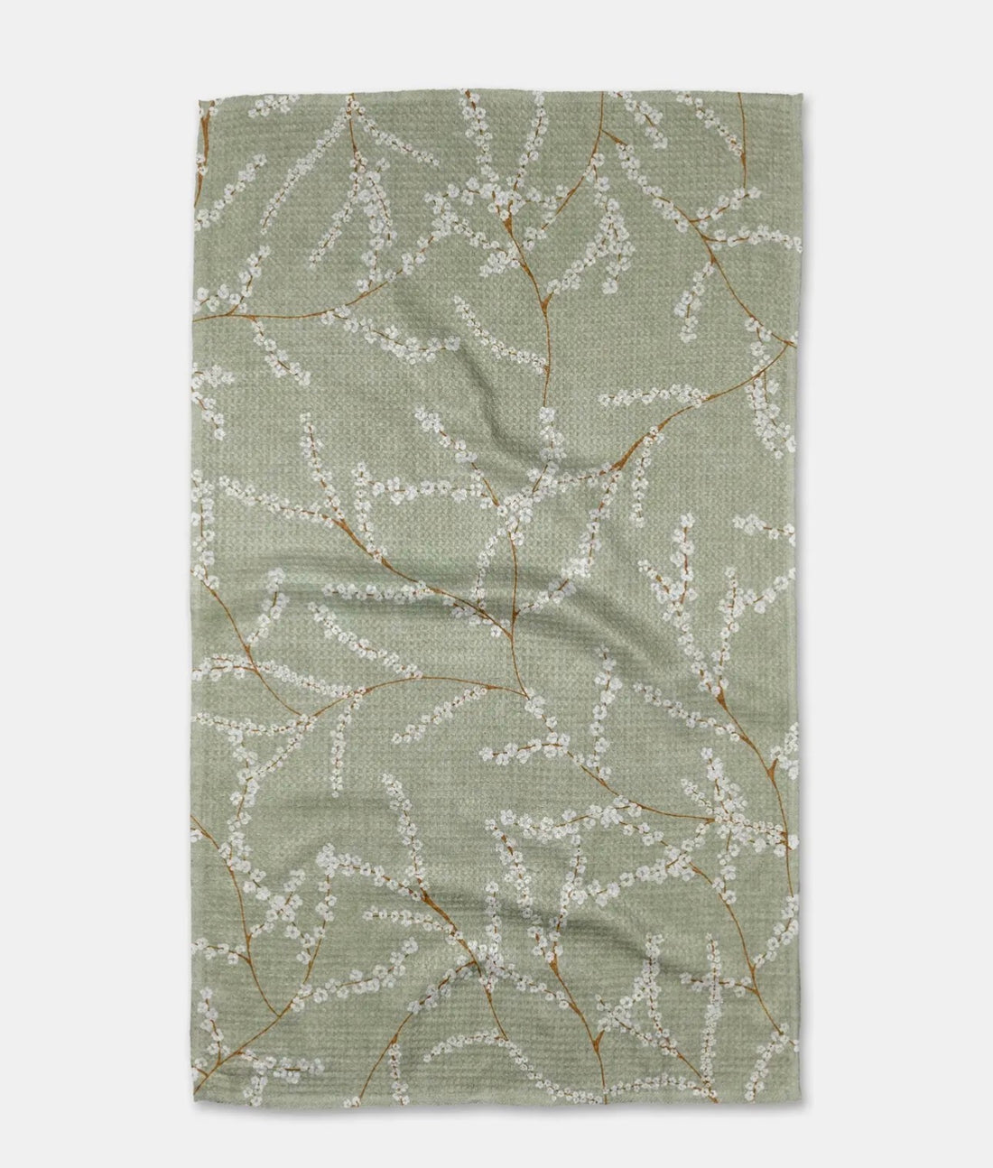 Sage green tea towel with white floral pattern