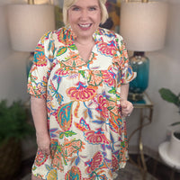 Woman wearing a colorful floral dress