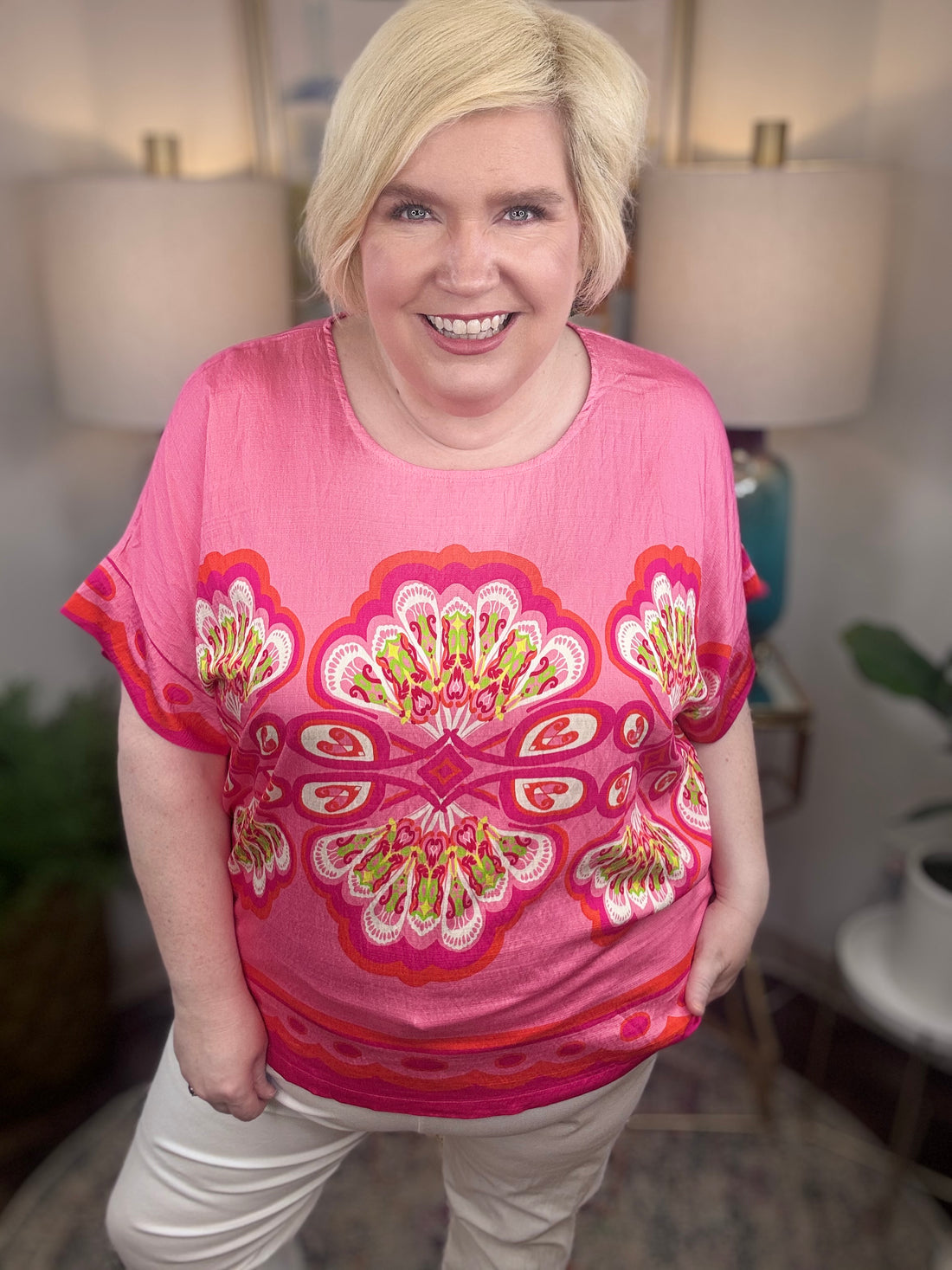 Woman wearing a pink floral top