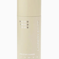 Beige bottle with text on a white background
