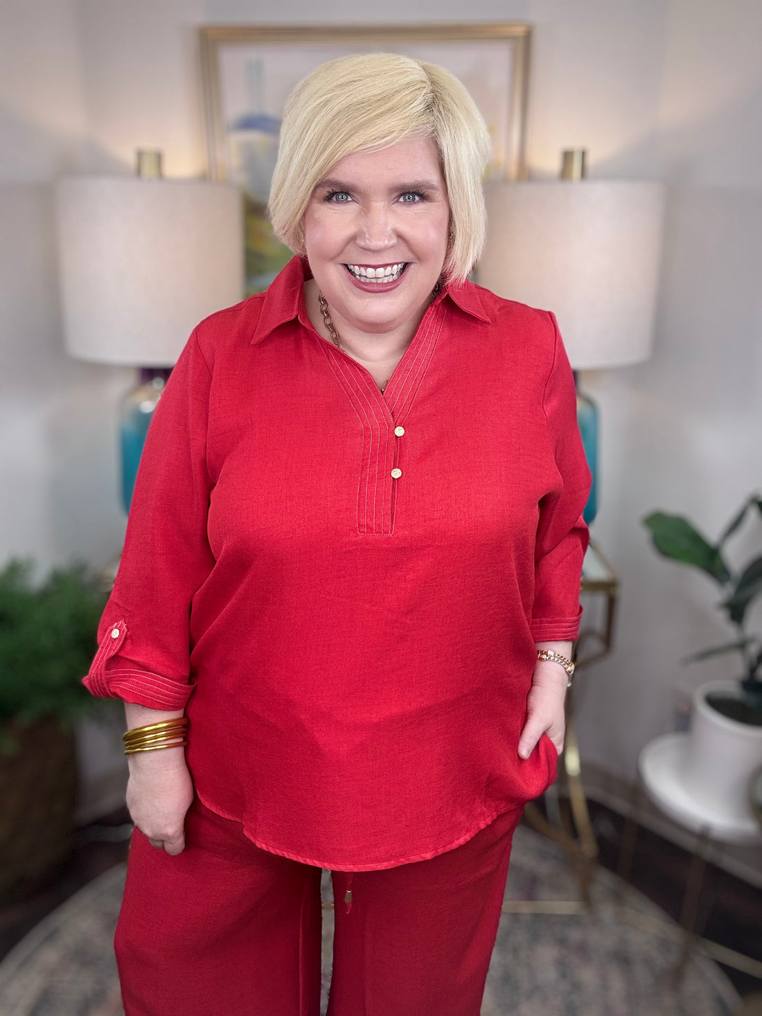 Women’s red matching set with gold button details