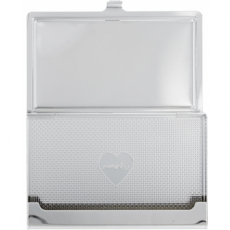 Silver business card holder with intricate pattern 