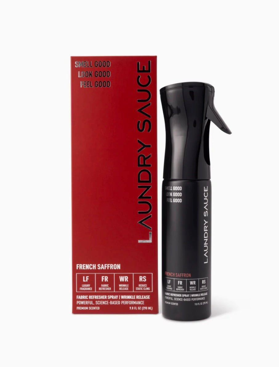 Laundry Sauce packaging with red box and black spray bottle on a white background