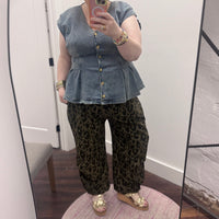 Dark olive green denim jogger pants with black leopard print