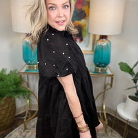Women's faux suede button down dress available in black and crimson