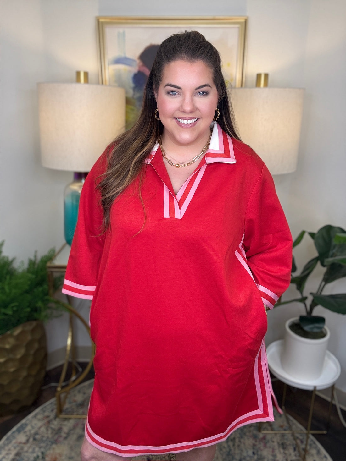 Woman wearing a red and pink dress