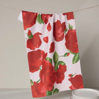 Towel with red rose pattern on a white background
