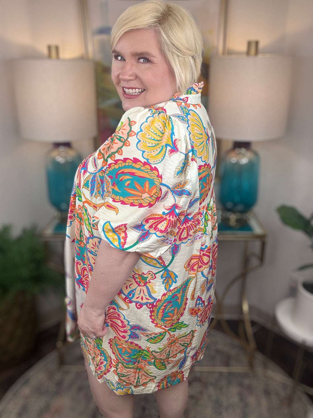 Woman wearing a colorful floral dress