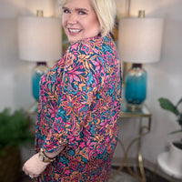 Dear Scarlett stretchy colorful floral dress with pink orange blue and teal tones