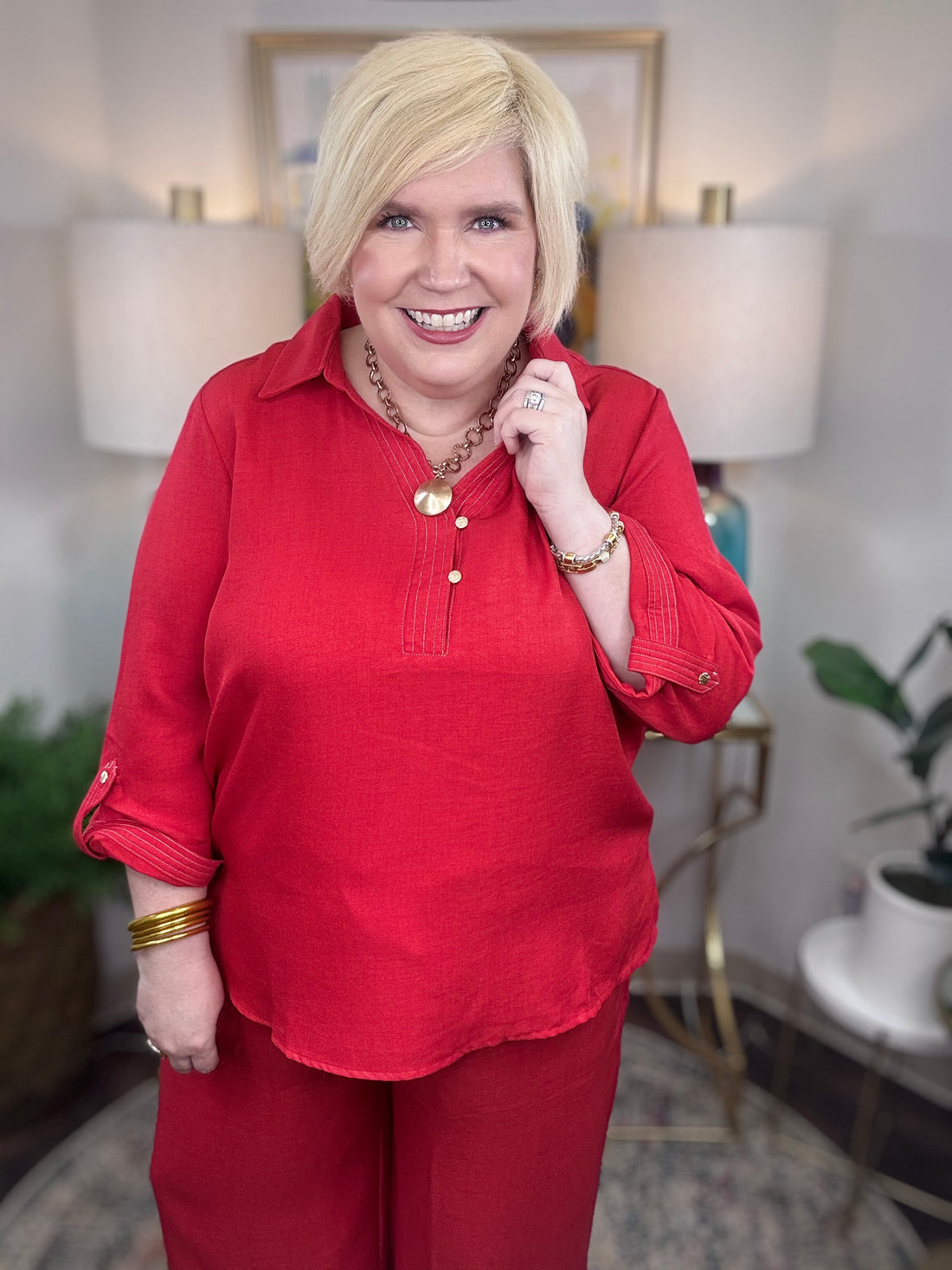 Women’s red matching set with gold button details